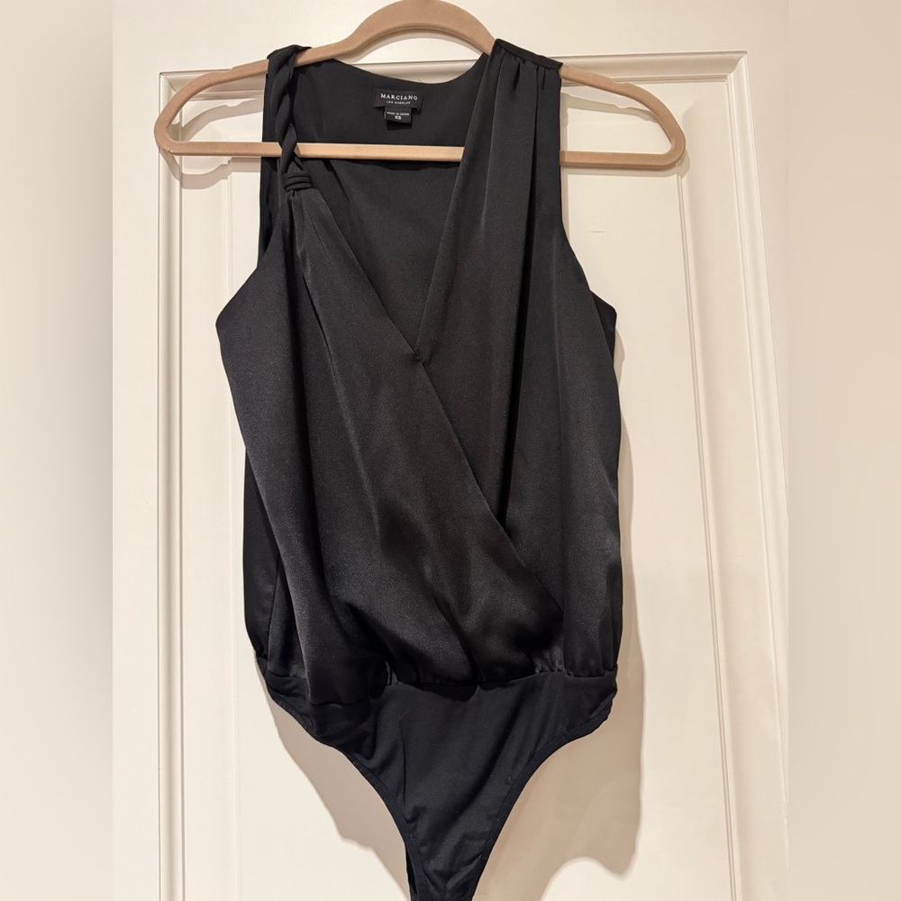 Woman’s silk bodysuit 🙌